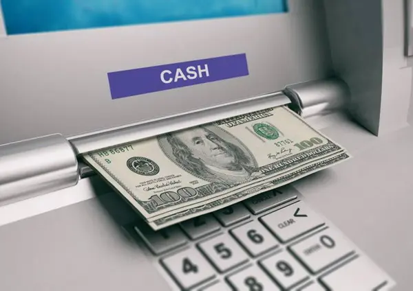 Cajeros automáticos y billetes de dólar